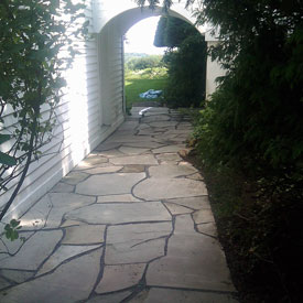 Rustic flagstone walkway.